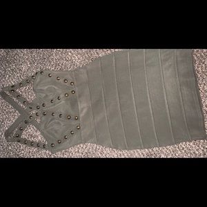 Cute green dress with brass accents, size 6 NWT